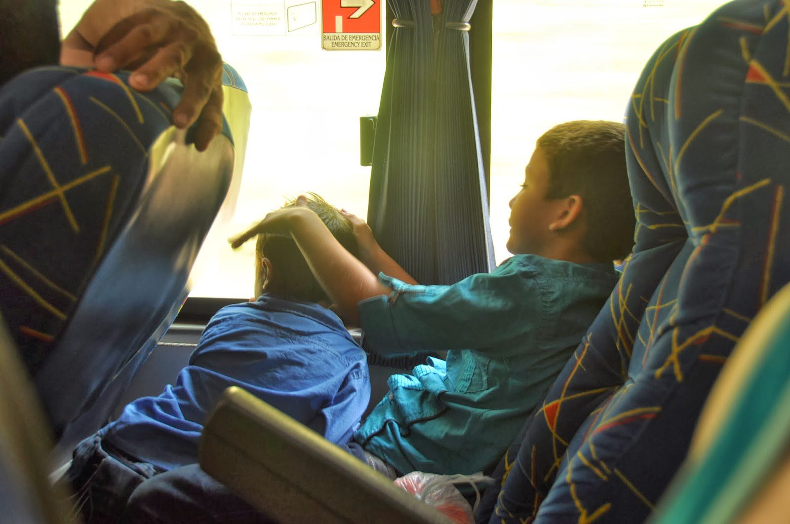 Boys sitting next to us on one of our many bus rides. Too cute to resist!