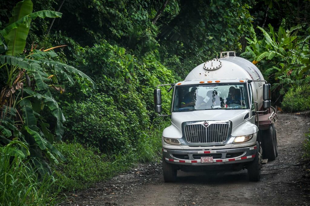 Renting a Car in Costa Rica Passing Semi Trucks