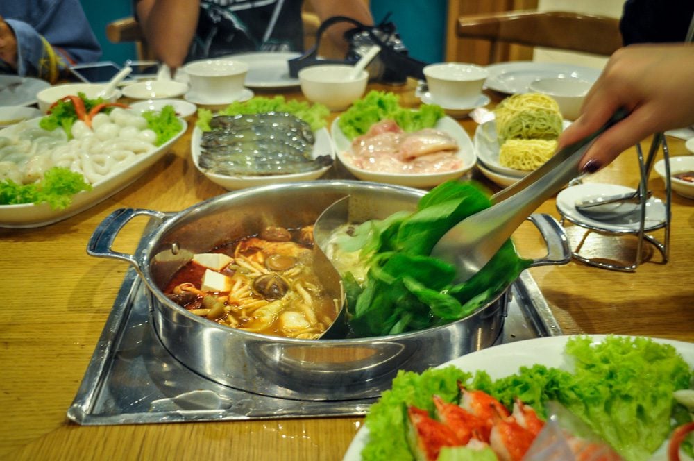 https://www.twowanderingsoles.com/wp-content/uploads/2019/10/foods-to-eat-in-Japan-shabu-shabu.jpg