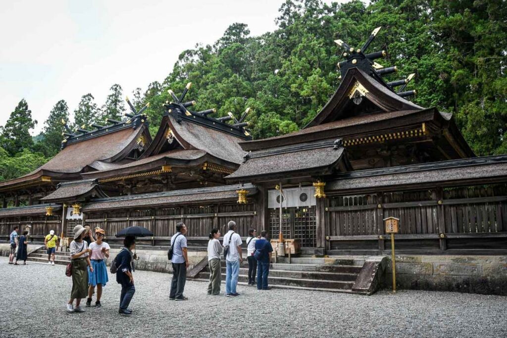 praying at a shrine in Japan