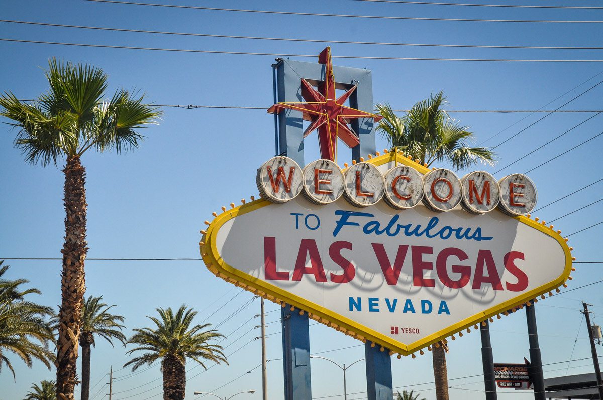 Welcome To Fabulous Las Vegas Sign With Arriving Airplane Stock