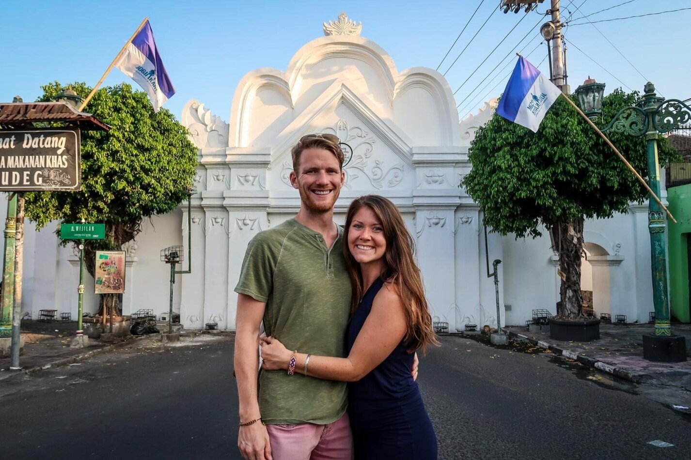 White washed walls surround the whole palace. We’re standing in front of one of the few road entrances.