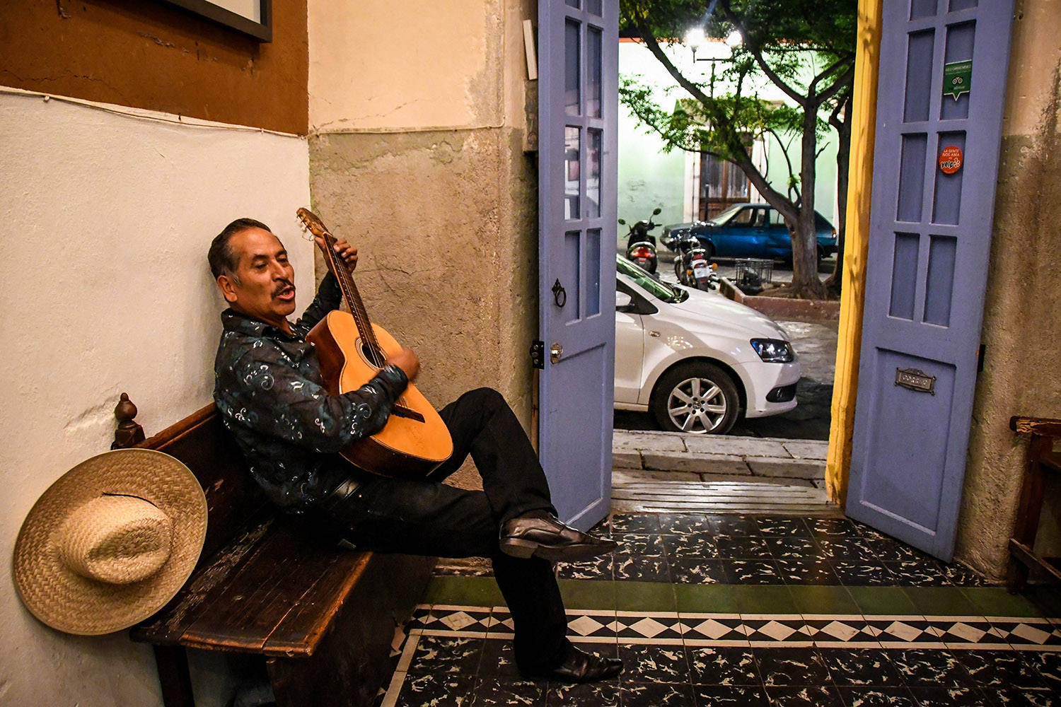 Things to Do in Oaxaca Guitar Player Mezcal
