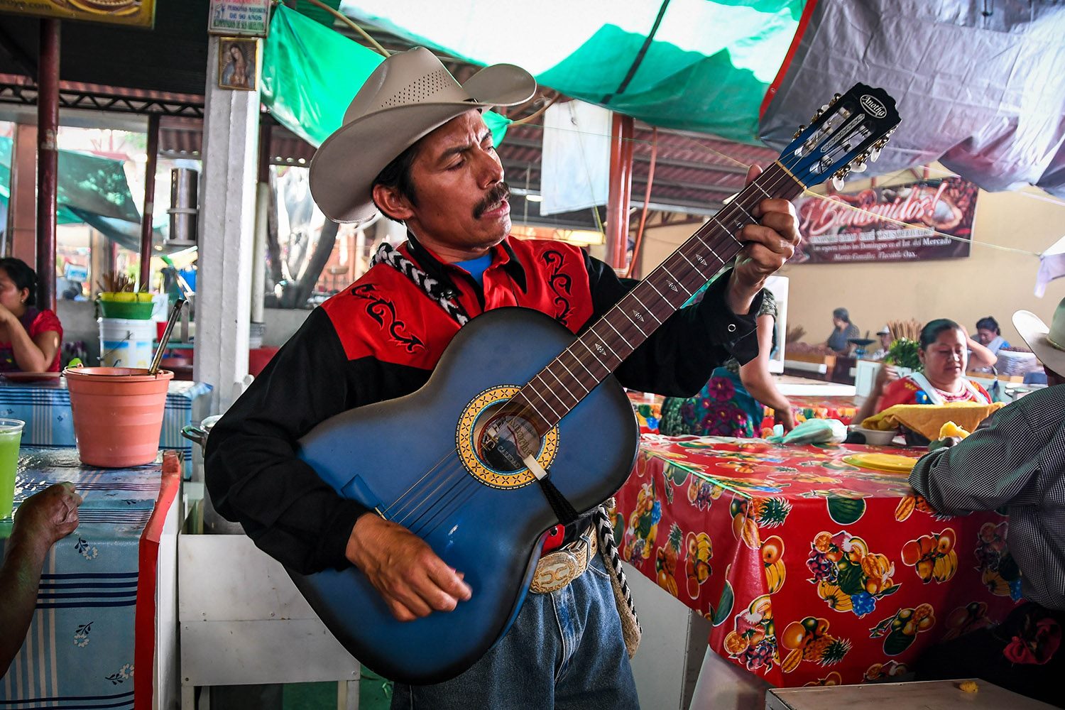 Things to Do in Oaxaca Sunday Market Tlacolula Guitar player