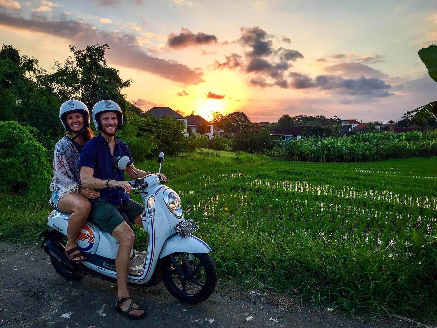 Travel Insurance Comparison - Scooter at sunset in Bali