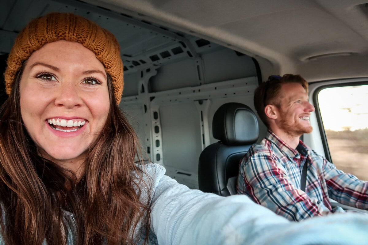 Look at those big grins! This was just after we purchased our (empty) cargo van. We were in the midst of dreaming big about our plans for this blank canvas…