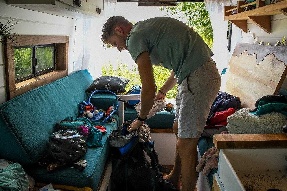 Whenever we pack for a backcountry camping trip, our van looks like a disaster zone… Oh, and peep the coffee grounds in the sink. Yikes, this is kind of embarrassing! Just wanted to show you that it’s not always clean and tidy in our van.