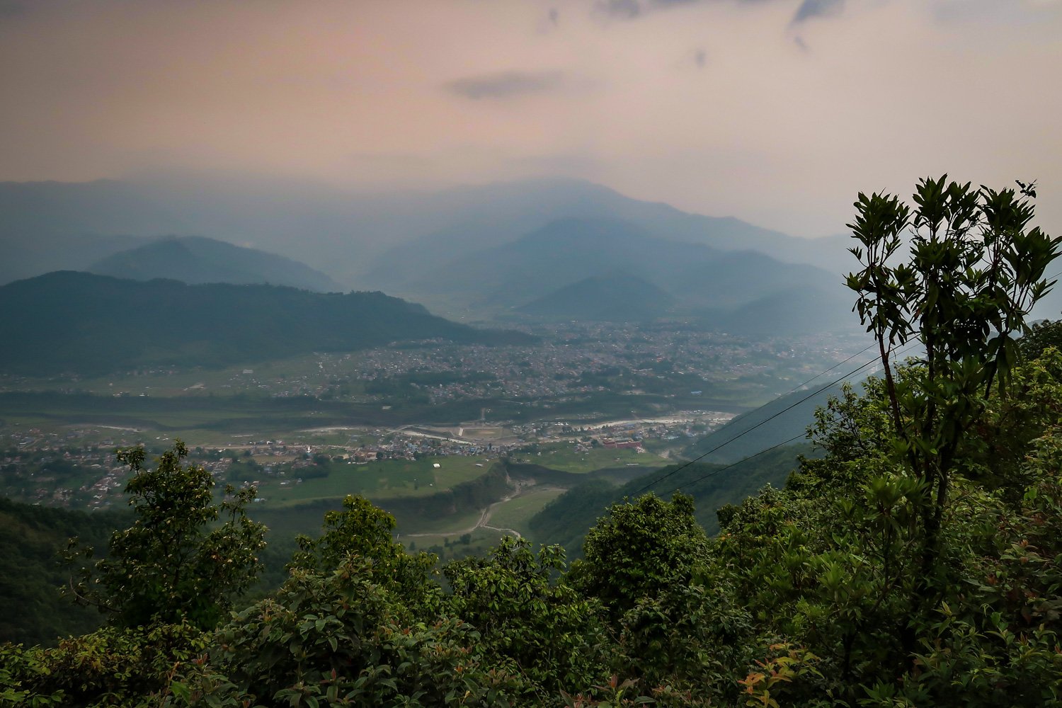 Here’s the zipline in Pokhara… see that steep wire on the right?! Oh, and check out that storm rolling in from a distance. This photo was taken just a few minutes before the lightening started!