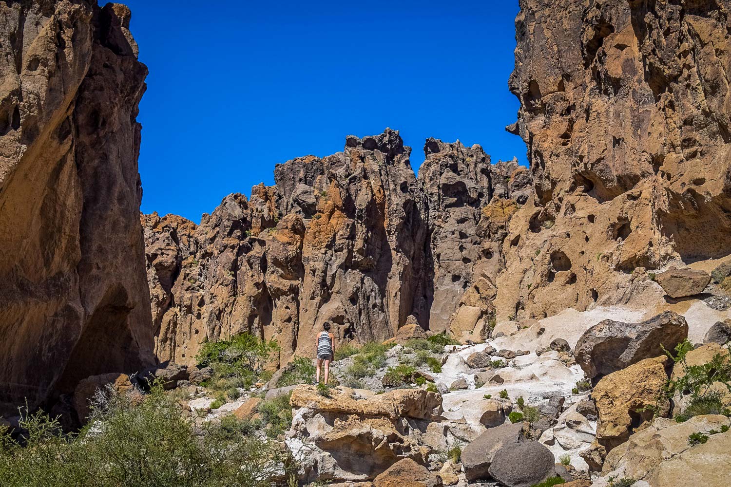 Best Desert Hikes in California: Hole in the Wall Trail Credit: We Who Roam