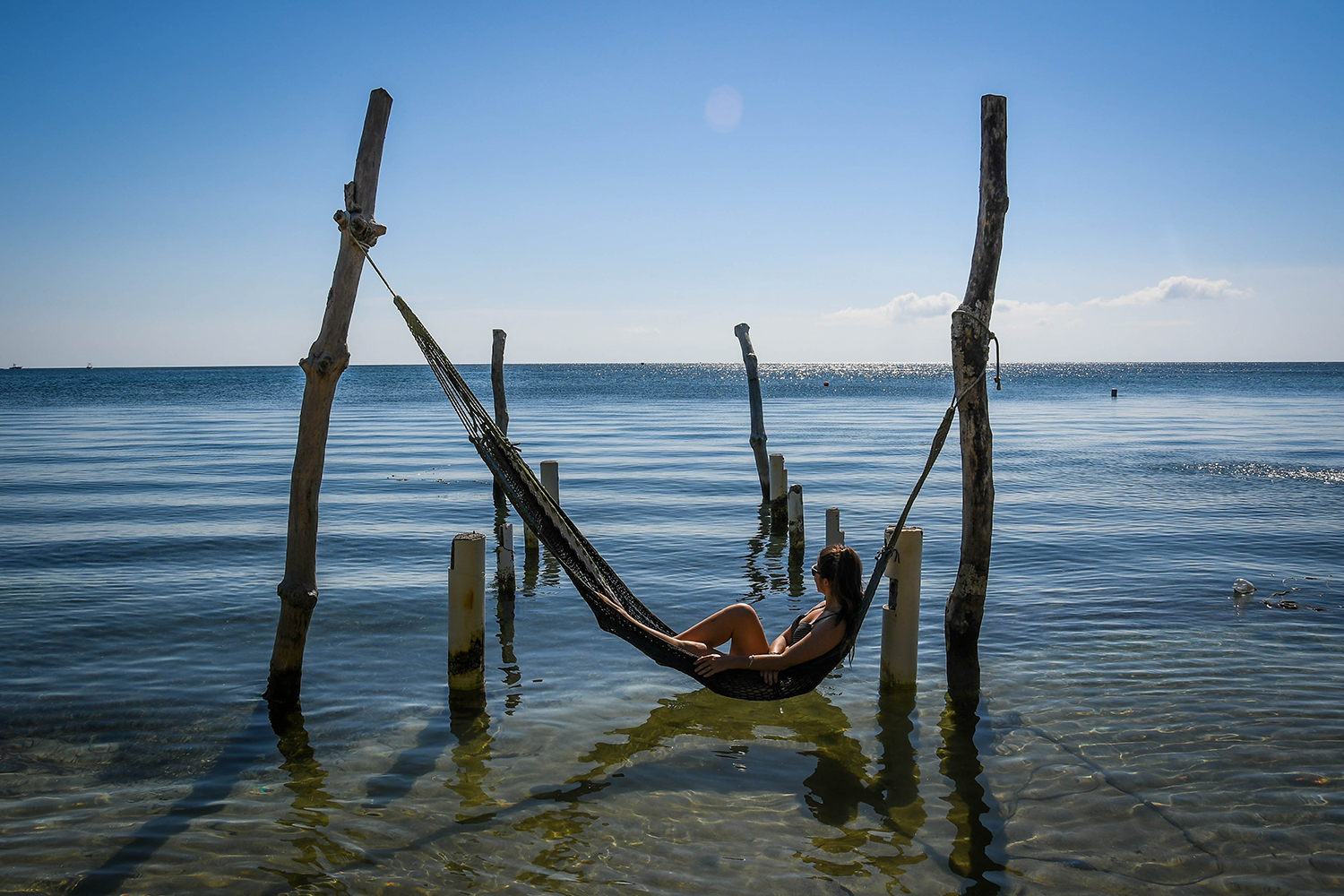 Roatan vs. Utila Honduras Bay Island Hammock over water