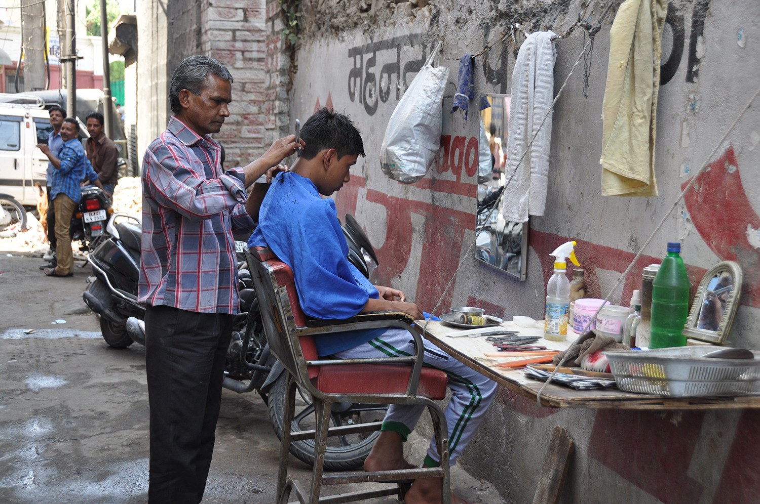 Street side barber in India