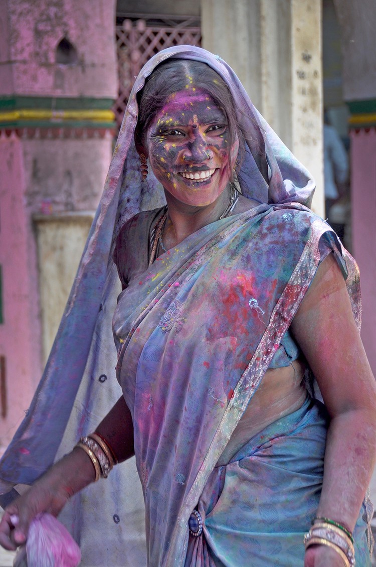 Woman celebrating Holi in India