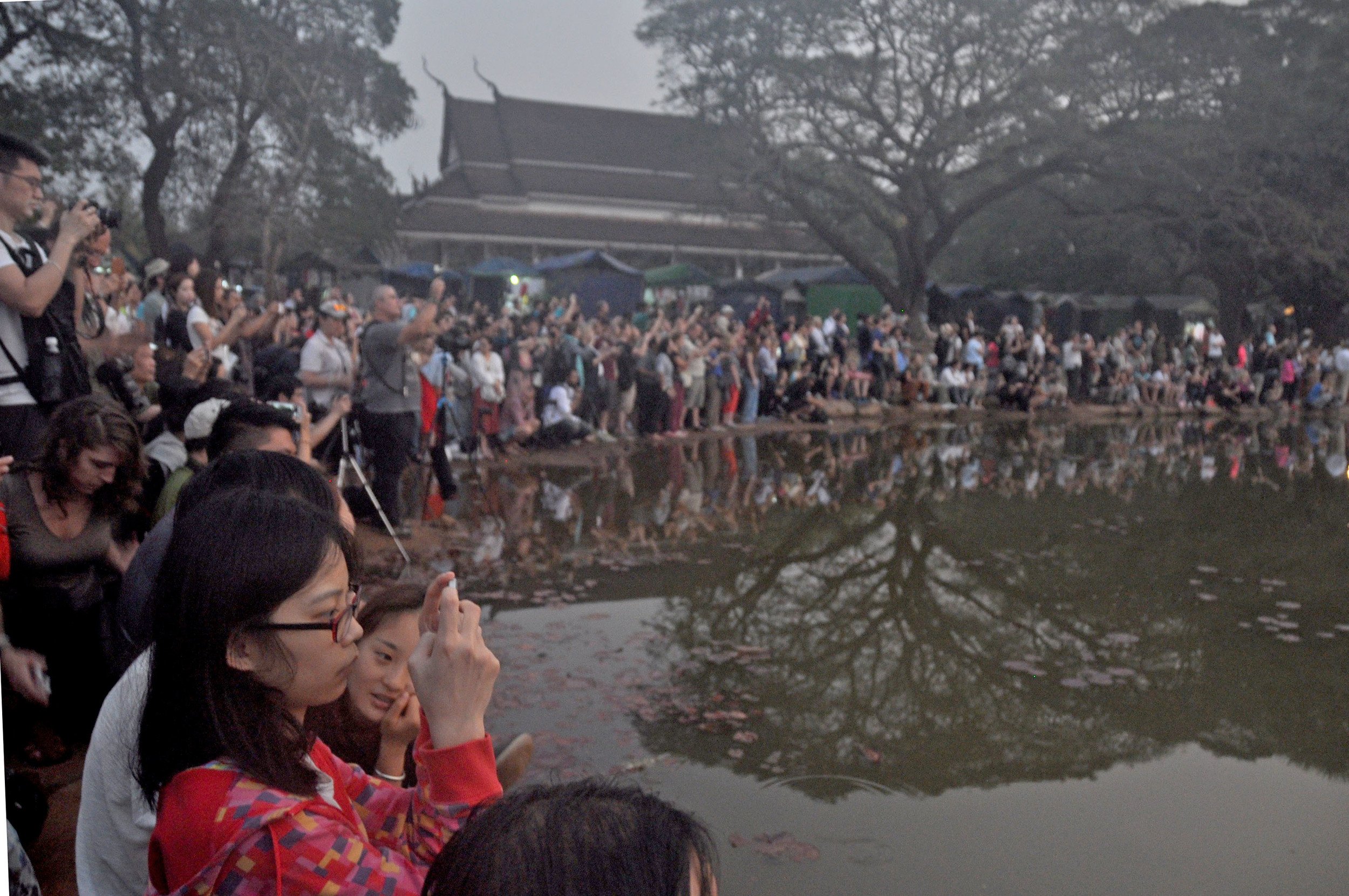 Crowds at Angkor Wat during sunrise