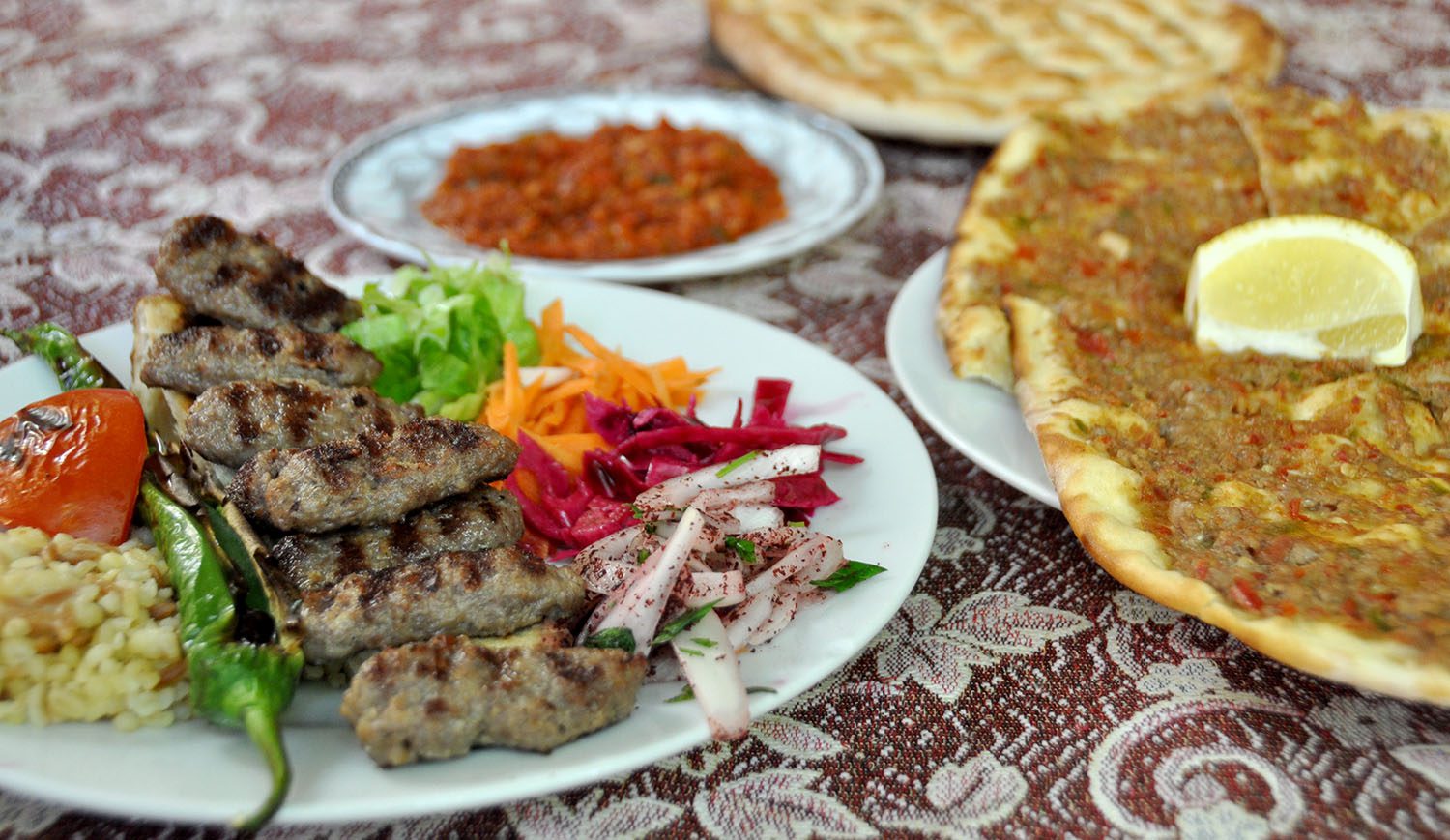 "Kebab" is more than just those wraps you get as drunk food! That's right, folks,kebabactually means something like "barbecue" and can refer to many dishes, like this one! Mmmm... and that bad boy on the right ispide,the Turkish version of pizza! You may just fall in love with the cuisine andtake a cooking class , like we did!