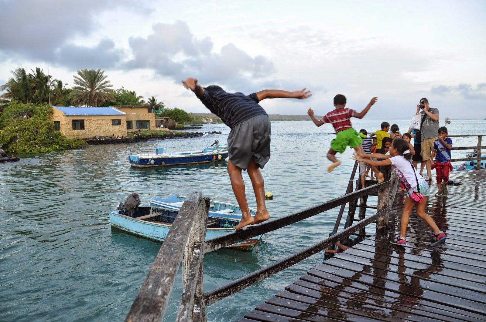 Watching the local kids push each other off the dock.