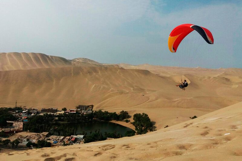 Paragliding over Huacachina Peru (Peru Cheap Tours)