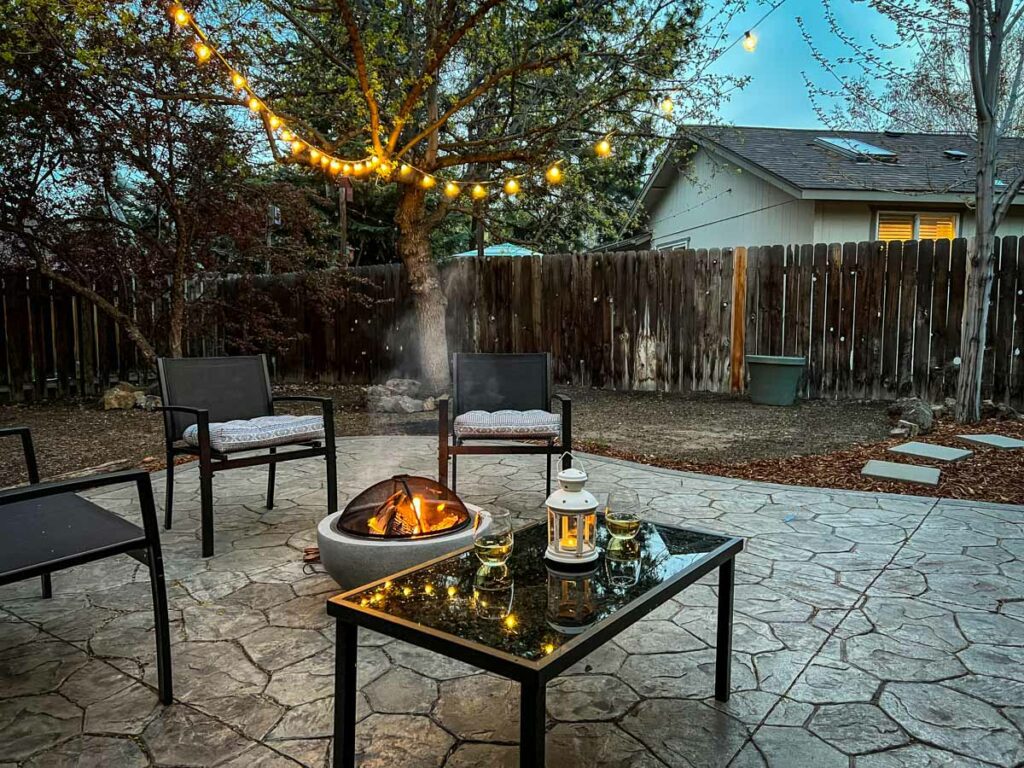 Backyard fire and cafe lights