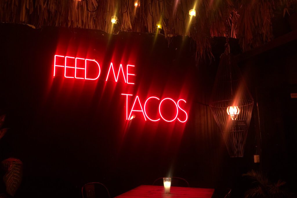 Feed me Tacos sign Bacalar Mexico