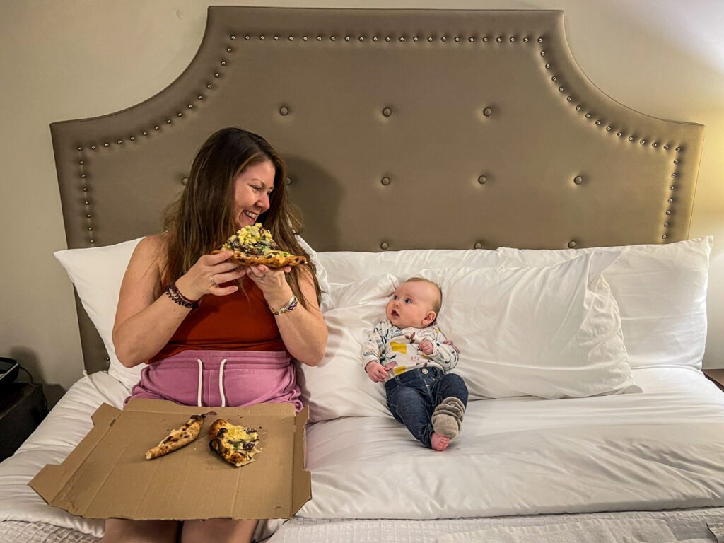 Takeout pizza hotel with a baby
