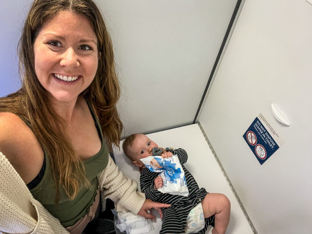 Flying with a baby airplane bathroom diaper change