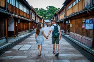 couple holding hands in Japan