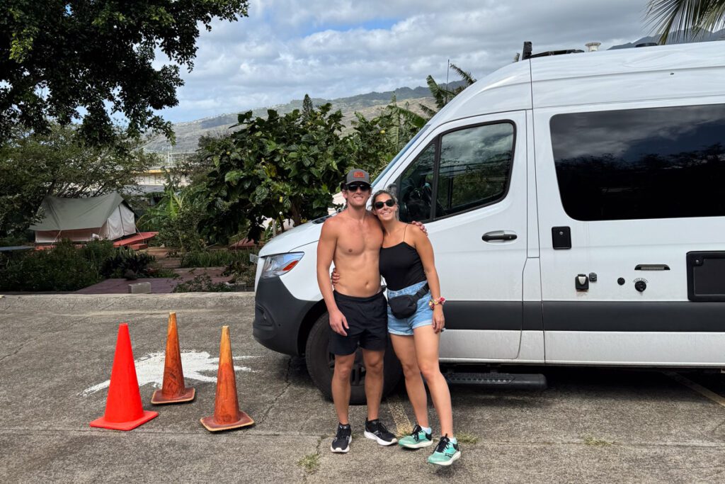Rachel and Anthony in front of campervan in Hawaii