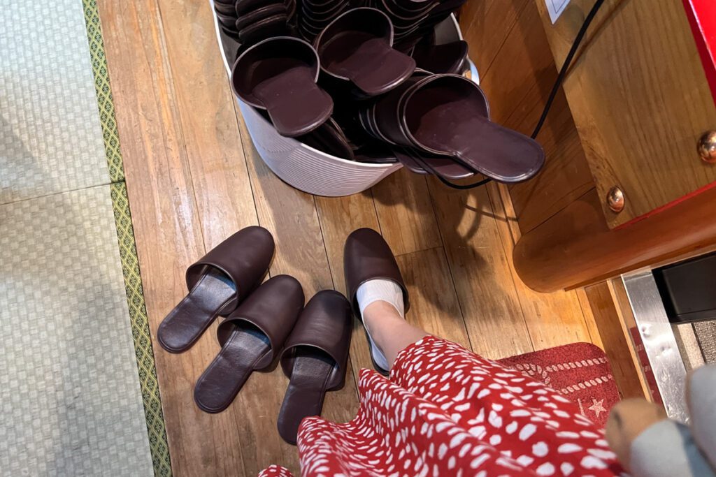 Removing your shoes on the Tokyo dinner cruise