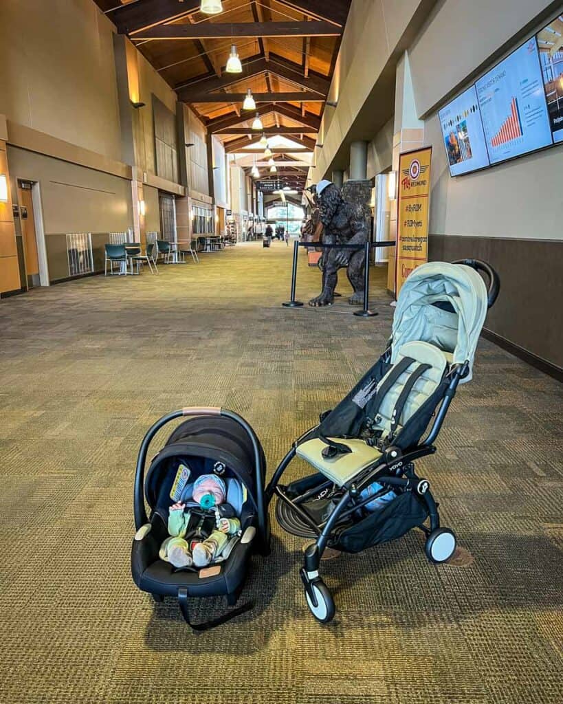 Car seat and stroller flying with a baby