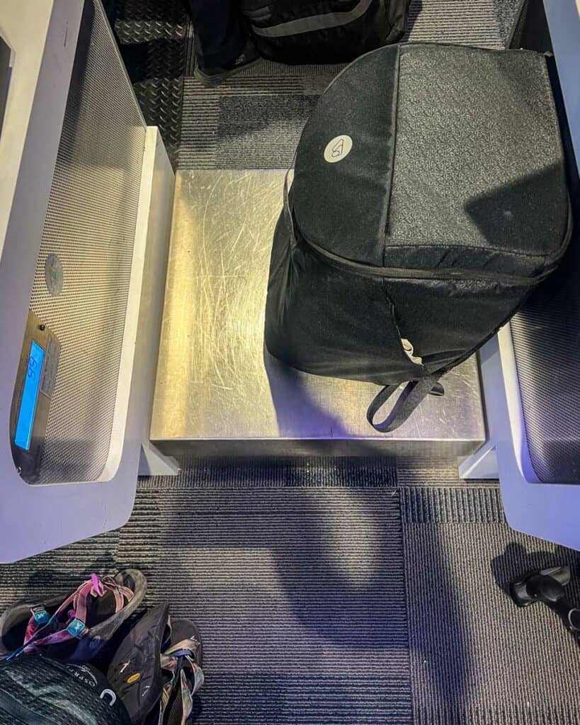 Weighing car seat bag at airport