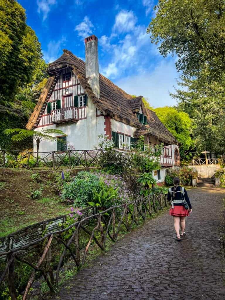 Thatched roof building at the start of the Levada do Caldeirão Verde hike in Madeira, Portugal
