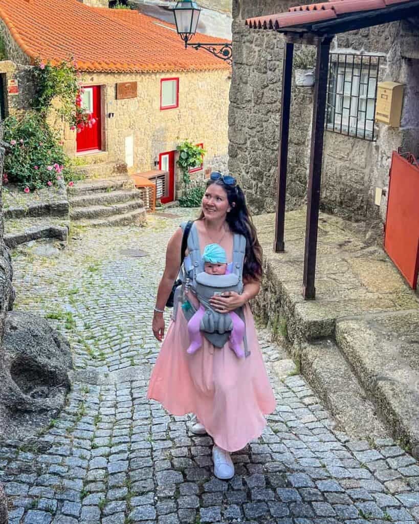 A baby carrier is much easier to use than a stroller on Portugal's hilly, cobbled streets!