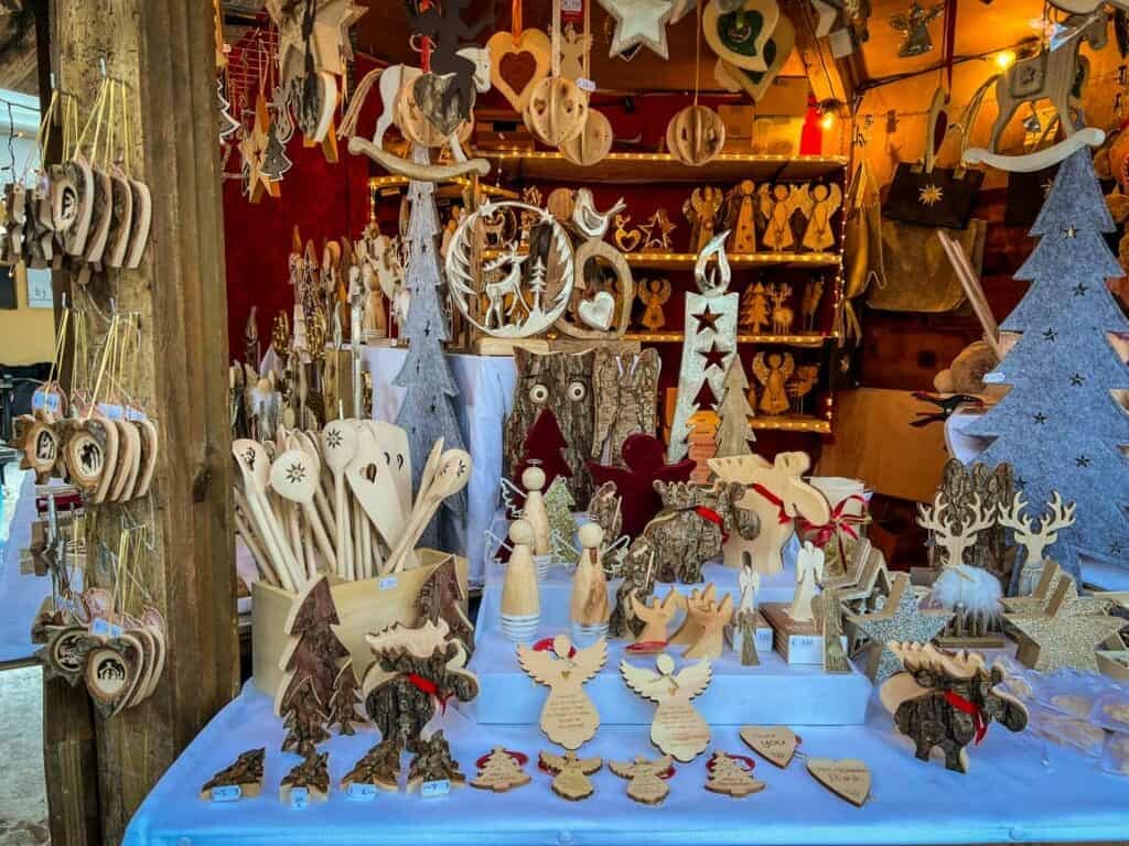 Wooden ornaments and artisan goods at the Seefeld Christmas Market in Seefeld, Austria