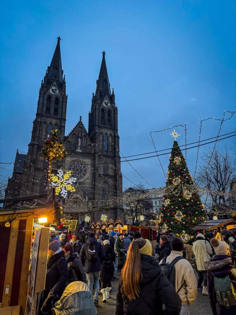 Bazilika sv. Ludmily and the Chritmas Tree at the Náměstí Míru (Peace Square) Christmas Market in Prague