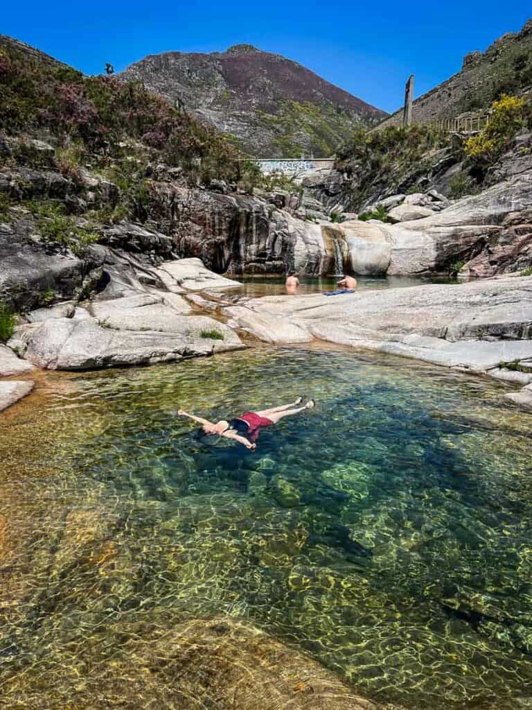 Swimming in the pools at Sete Lagos hike in Peneda-Gerês National Park Portugal