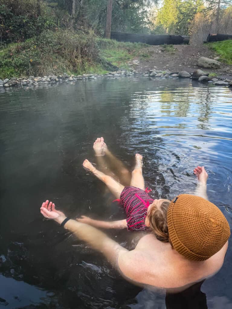 Ben & Juniper floating at McCredie Hot Springs Oregon